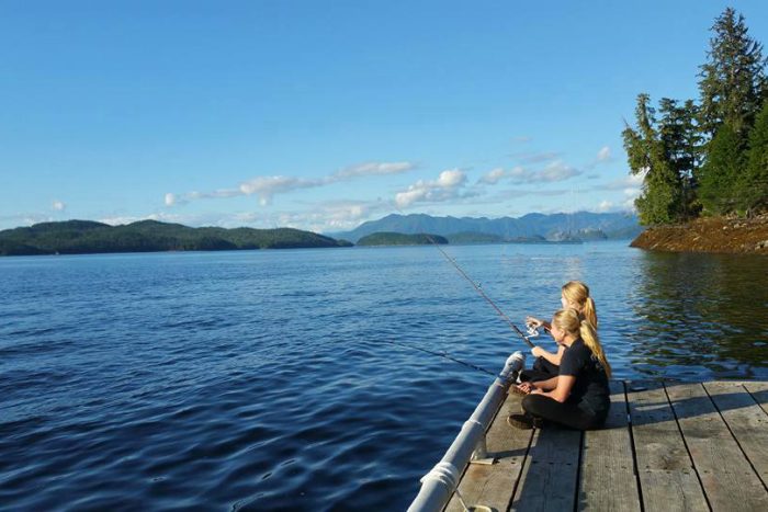 Dock Fishing Kids fishing off the dock at a fishing lodge in Ketchikan