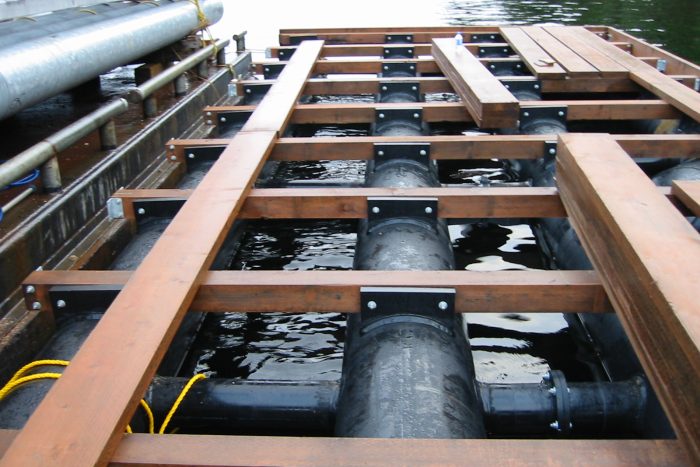 Marine Float Tubs Marine float tubs used in dock construction at fishing lodge in Ketchikan Alaska