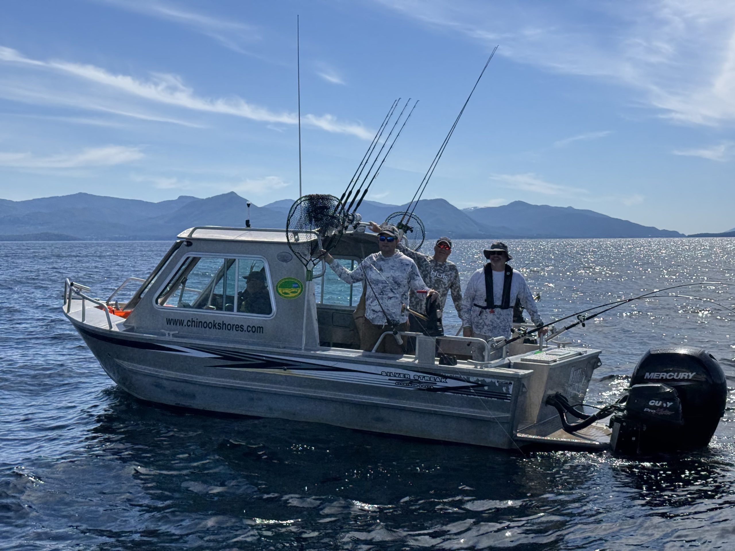 fishermen trolling for salmon in a self-guided Silver Streak sport fishing boat