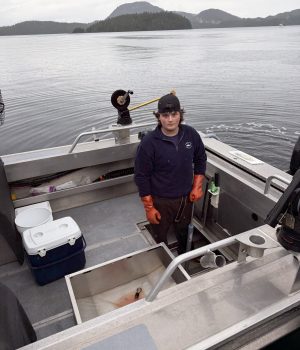 Dock Hand Kaden cleaning silver streak rental boat